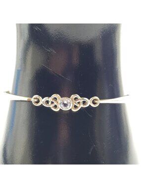 Sterling Silver Celtic Knot Bangle Bracelet With Blue Topaz Accent 8.41 Grams